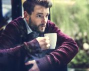 man sipping coffee